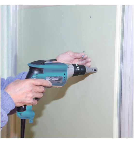 Makita Schnellbauschrauber 570 W, 0-6.000 Min 4 Makita Schnellbauschrauber 570 W, 0-6.000 Min – Bild 2